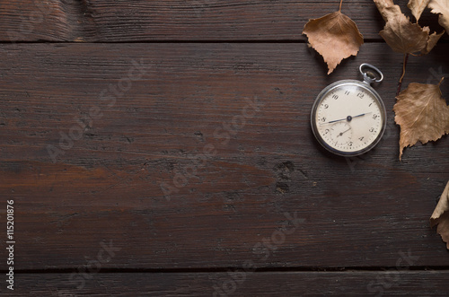 Clock in Autumn Leaves