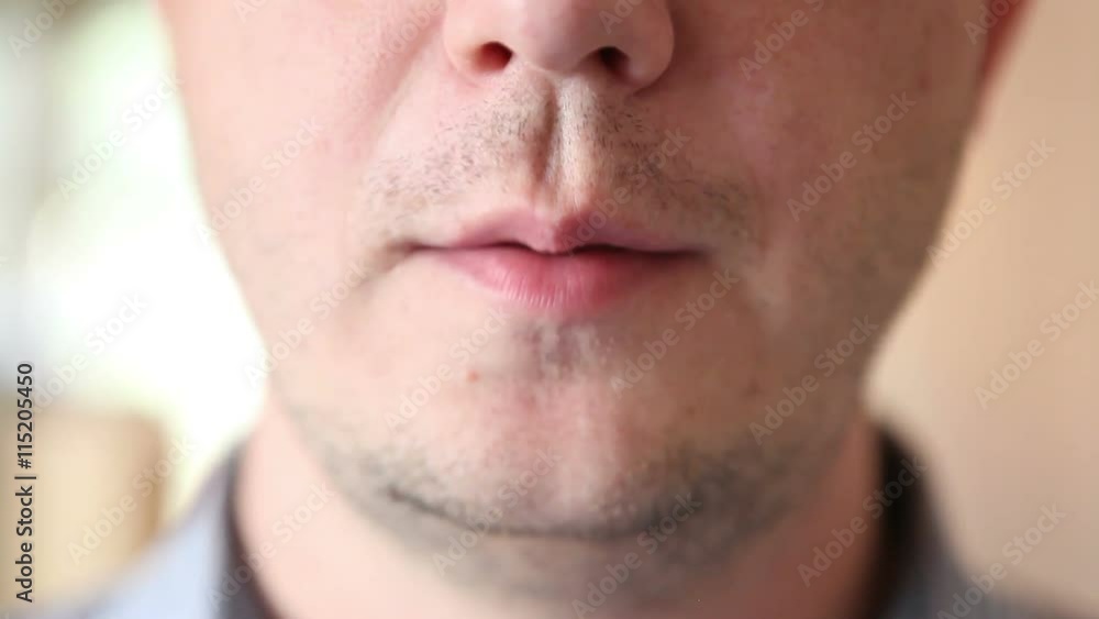 the man says. Part of Face closeup the man says. Part of Face closeup