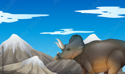 Scene with dinosaur and mountains