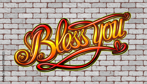 Bless you inscription on the wall of red brick