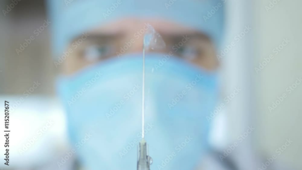 Doctor with syringe Doctor with syringe