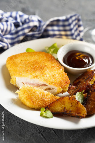 Fried chicken stuffed with ham and cheese