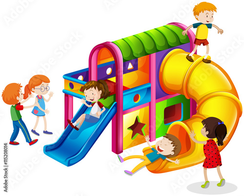 Children playing on slide at playground