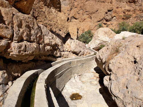 Falaj - irrigation channel in Wadi Shab, Ash Sharqiyah region, Sultanate of Oman
