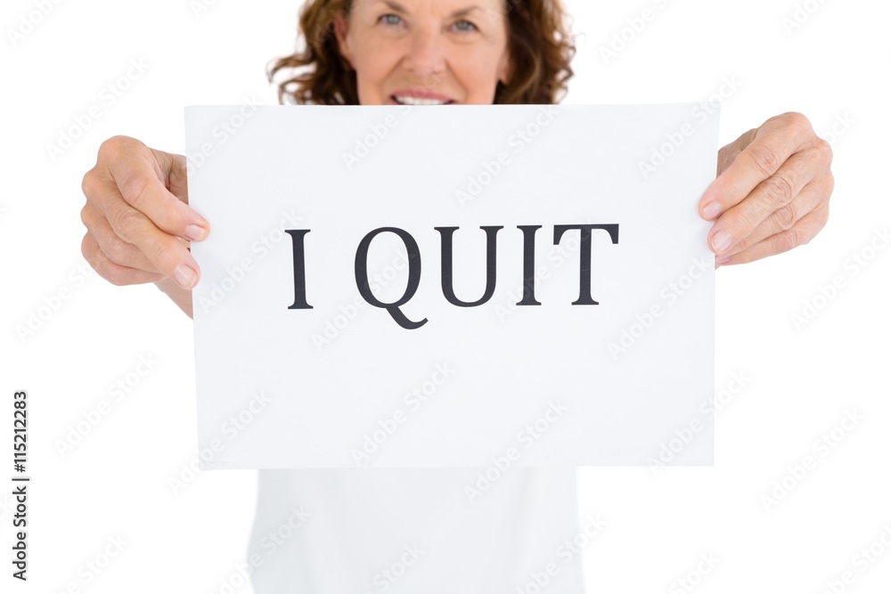Portrait of smiling woman holding paper with message Portrait of smiling woman holding paper with message