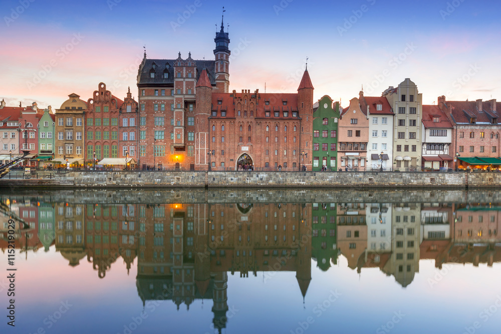 Old town of Gdank with reflection in Motlawa river at sunset, Poland