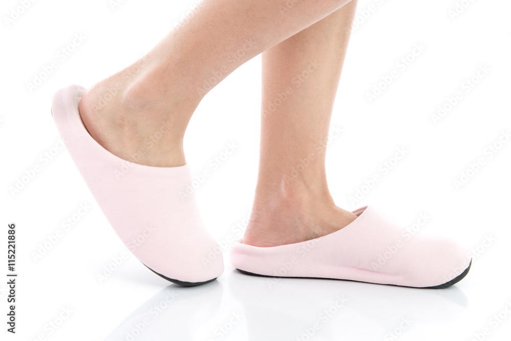 Female's feet withslippers.
