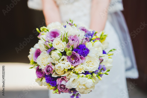 Wedding bouquet in bridal hands
