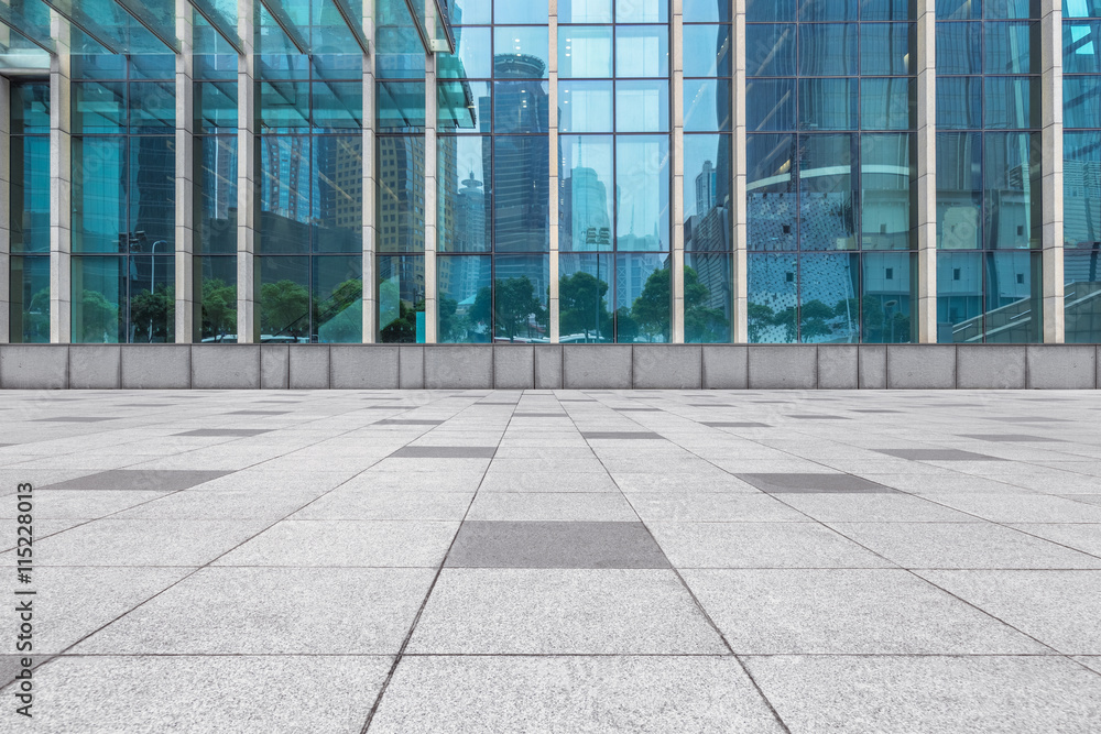 empty pavement front of modern architecture