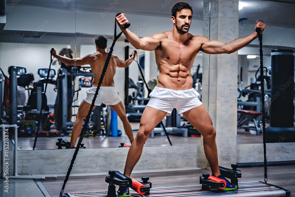 Fototapeta premium Man trains on slider