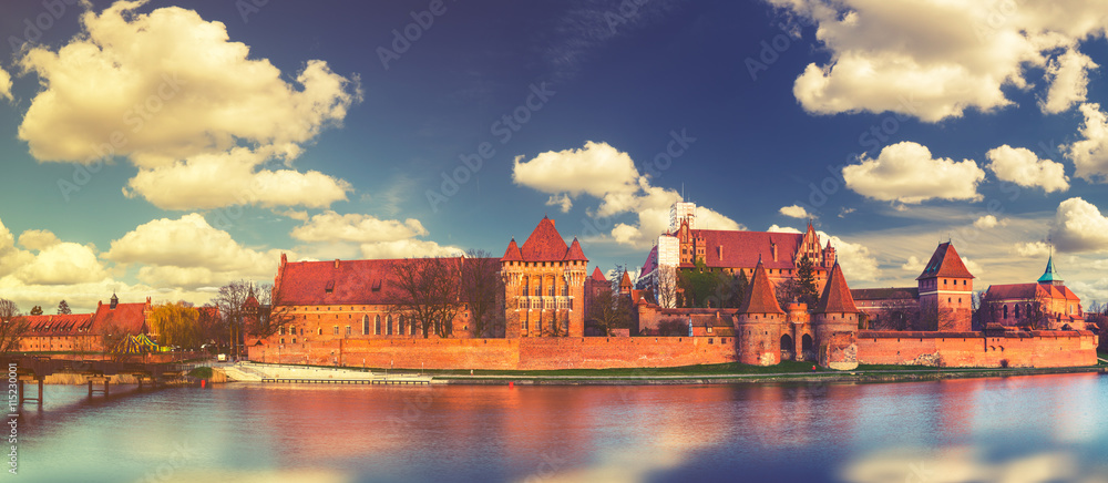 Fototapeta premium Vintage retro stylized photo of Teutonic Castle in Malbork (Marienburg) in Pomerania (Poland)