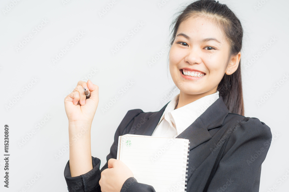 Portrait of happy asian smiling business woman with booklet wear Portrait of happy asian smiling business woman with booklet wear