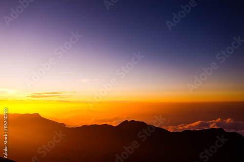 Sunrise on the mountain Adam's Peak. Sri Lanka. © Beautiful textures