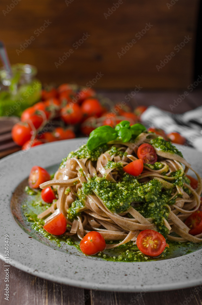 Fototapeta premium Pasta with basil pesto and parmesan