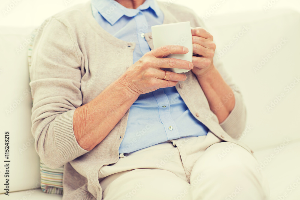 close up of senior woman with tea cup at home close up of senior woman with tea cup at home