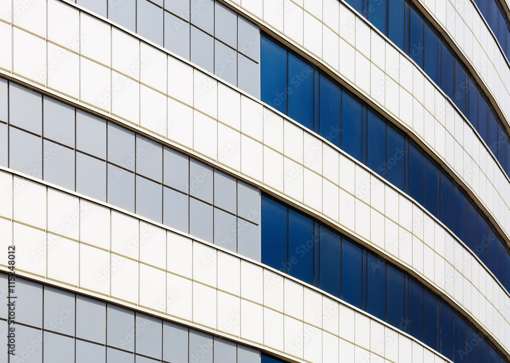 Close-up of modern architecture. Common modern business industrial architecture. Modern office building. Close-up of modern architecture. Common modern business industrial architecture. Modern office building.