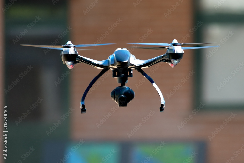 drone flying near house - obrazy, fototapety, plakaty 