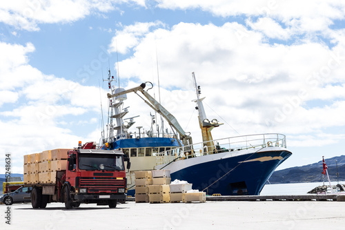 trabsportation ship and truck with blue sky. © watcharapas