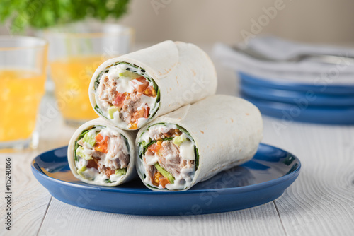 Tuna wraps with avocado tomato and mayonnaise