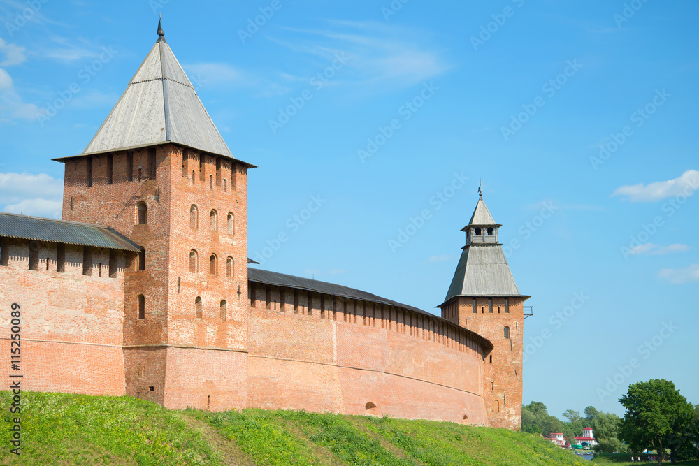 The view on two towers of Novgorod Kremlin, sunny day in July. Veliky Novgorod, Russia The view on two towers of Novgorod Kremlin, sunny day in July. Veliky Novgorod, Russia
