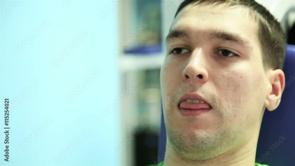 handsome guy doing strength exercises in the gym. handsome guy doing strength exercises in the gym.