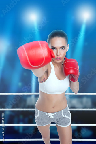 Woman with boxing gloves © Dmitry Bairachnyi
