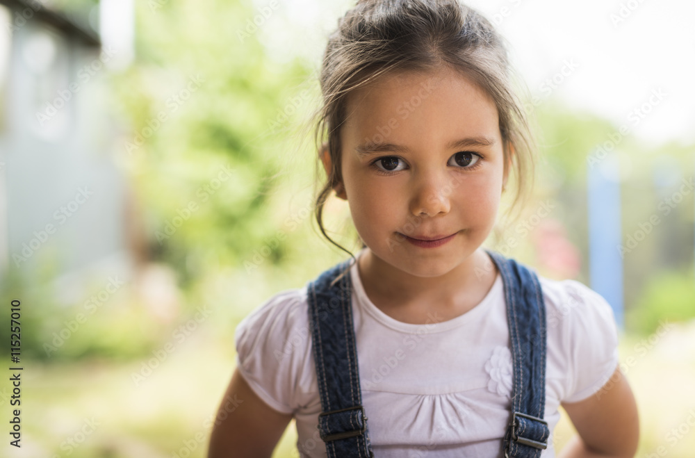 Outdoor portrait of a smiling little girl Outdoor portrait of a smiling little girl