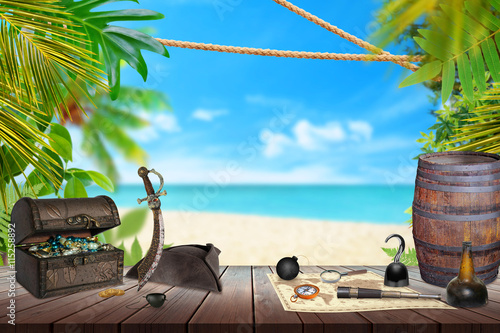 Pirate table with treasure, map, rum, compass, knife. Palm tree, beach and sea in background.