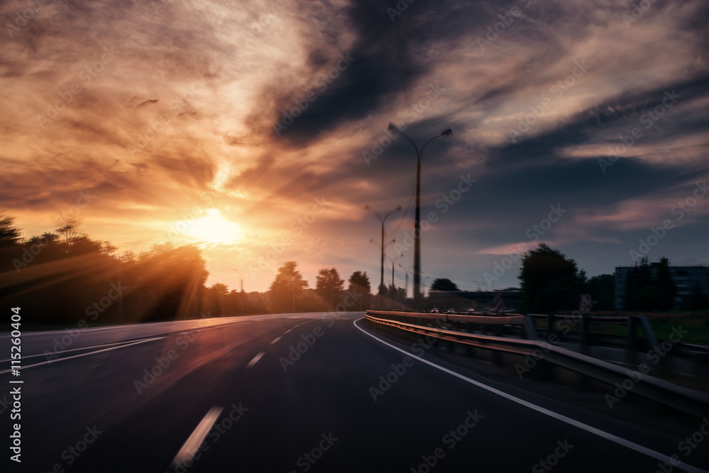 Drive car at beautiful sunset. Nature landscape
