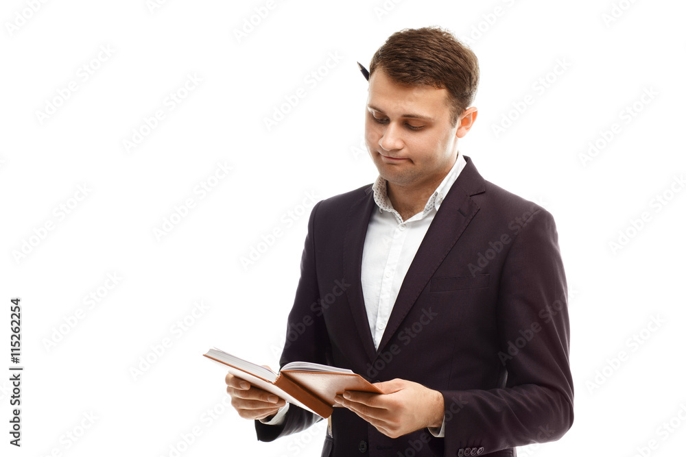 Handsome businessman with diary Handsome businessman with diary
