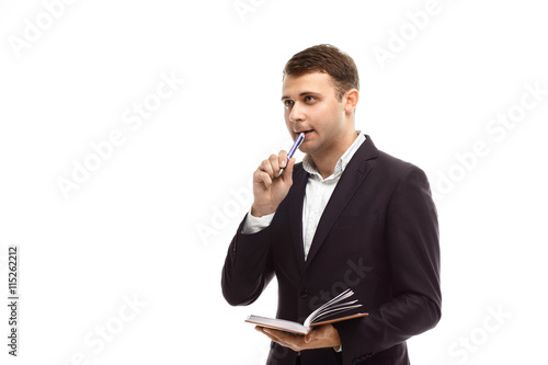 Handsome businessman with diary