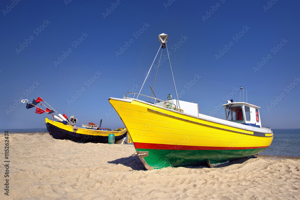 Fishing boats by the sea
