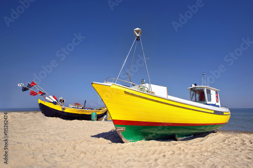 Fishing boats by the sea