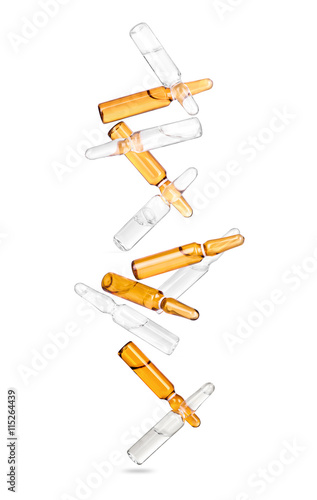 falling ampoules isolated on a white background