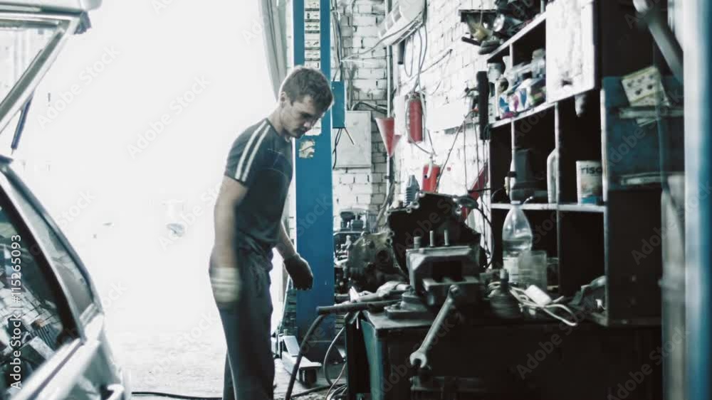 Mechanical repairs a part of the car in car service use Water Displacement