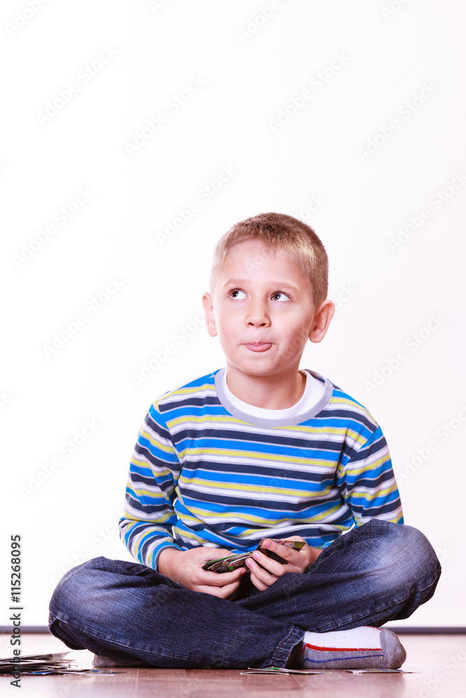 Little boys have fun and play cards. Little boys have fun and play cards.