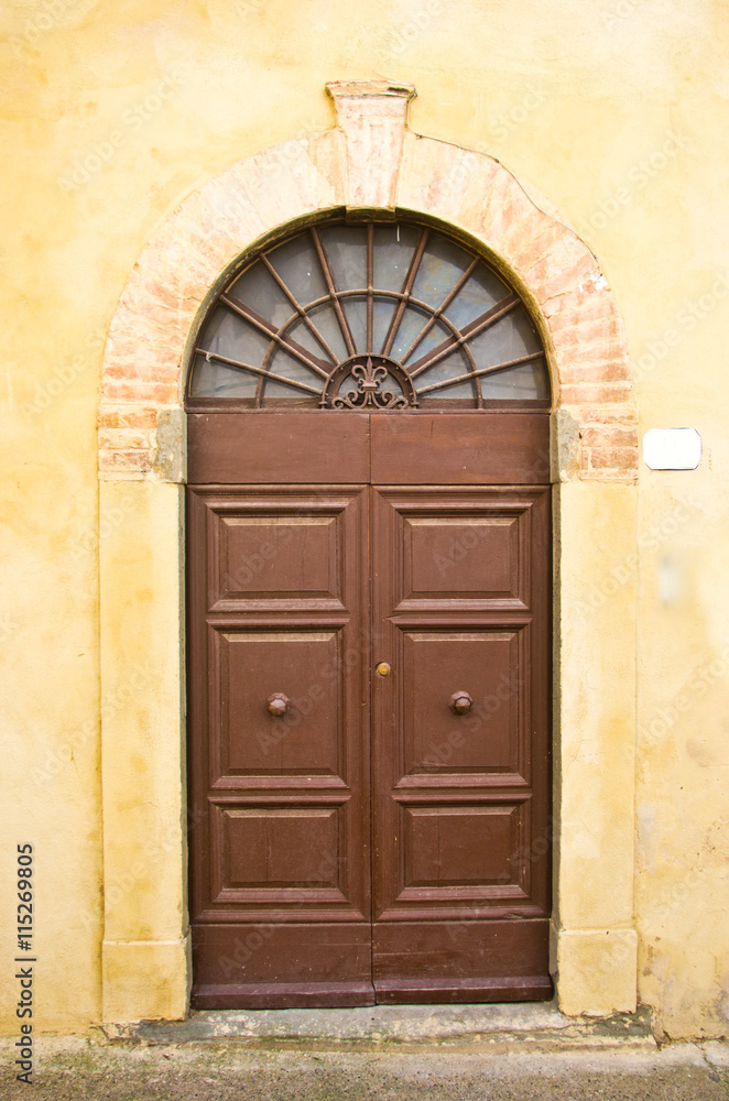 ancient wooden door of historic building