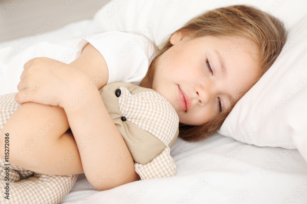 Girl sleeping sale with teddy bear