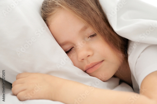 Adorable sleeping little gi...