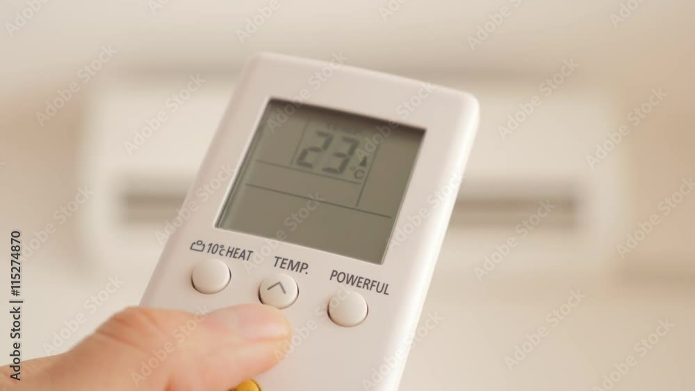 Cooling down room temperature with air conditioner 4K 2160p UHD video - Changing room temperature with AC remote controller 4K 3840X2160 UHD footage Cooling down room temperature with air conditioner 4K 2160p UHD video - Changing room temperature with AC remote controller 4K 3840X2160 UHD footage