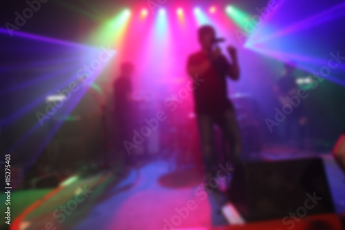 Blurred Singer band on stage in pub  © emodpk