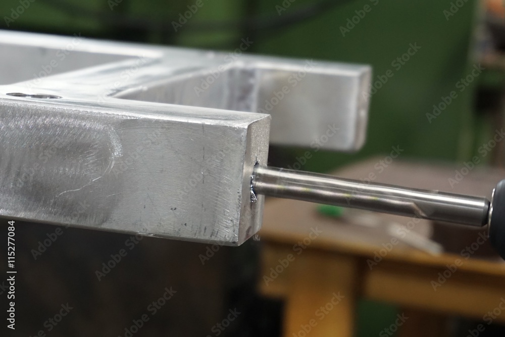Obraz premium drilling metal tube
