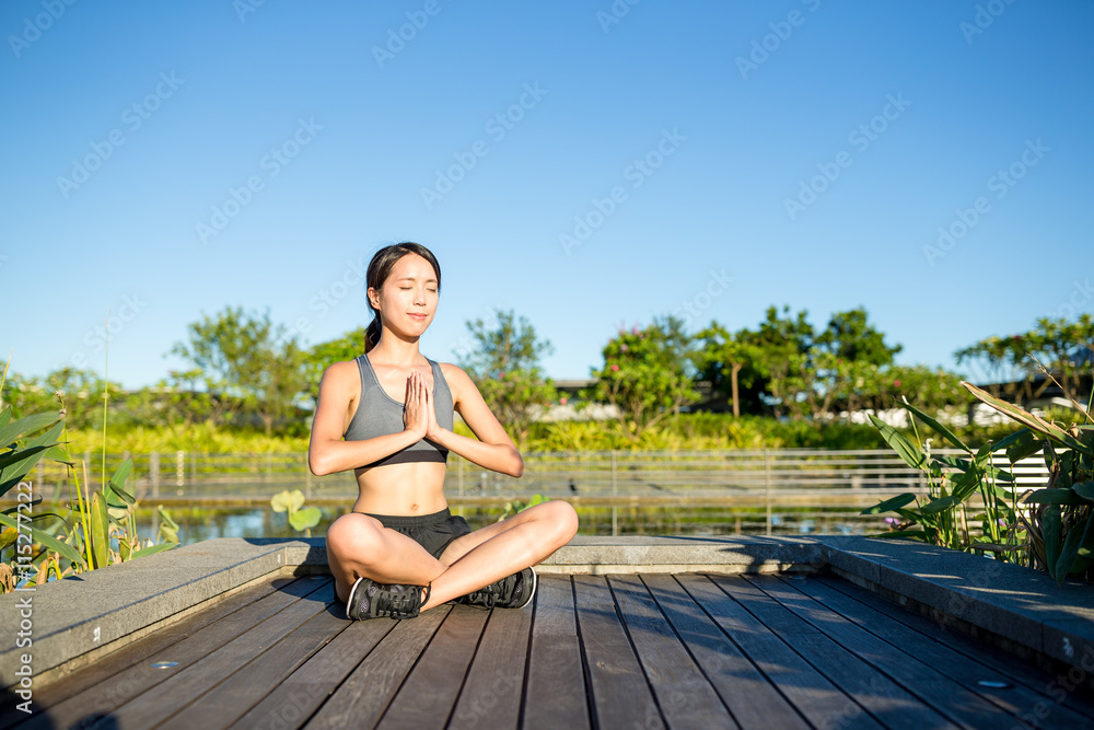 Meditation yoga woman at outdoor park