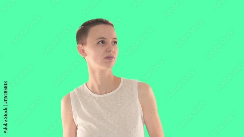 Beautiful bald girl, a girl with short hair brunette, can not make a decision what she should do. Beautiful bald girl, a girl with short hair brunette, can not make a decision what she should do.
