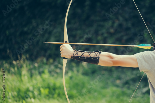 Archer hands with bow