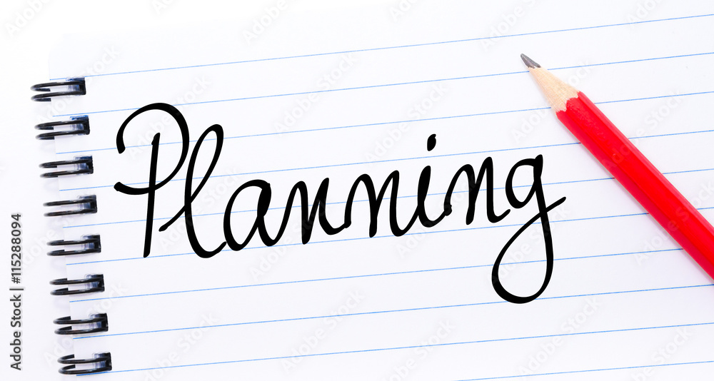 Planning written on notebook page Planning written on notebook page