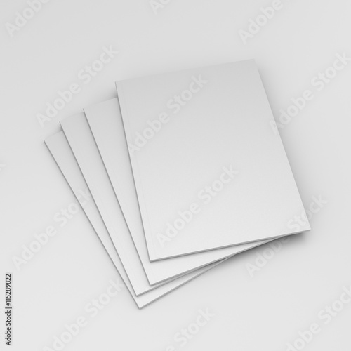 small stack of catalogs or magazines isolated