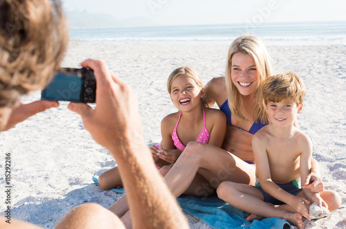 Family taking picture © Rido