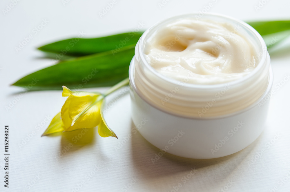Jar of beauty cream with tulip Jar of beauty cream with tulip