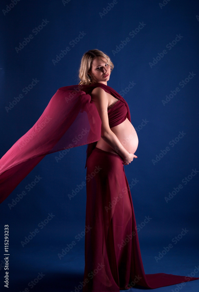 Fototapeta premium Pregnant woman is expecting a baby